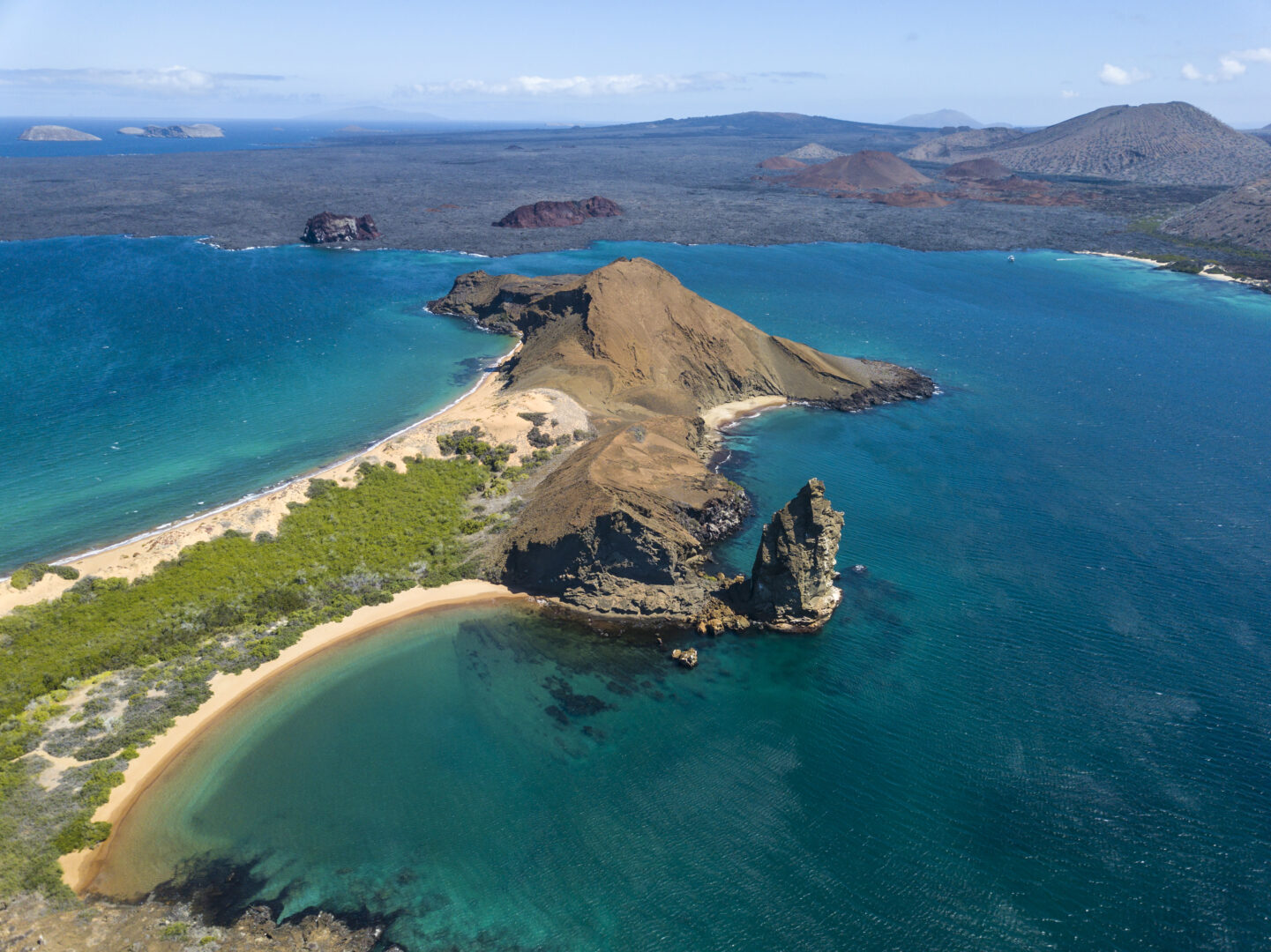 famous pinnacle rock on the small island in the galapagos