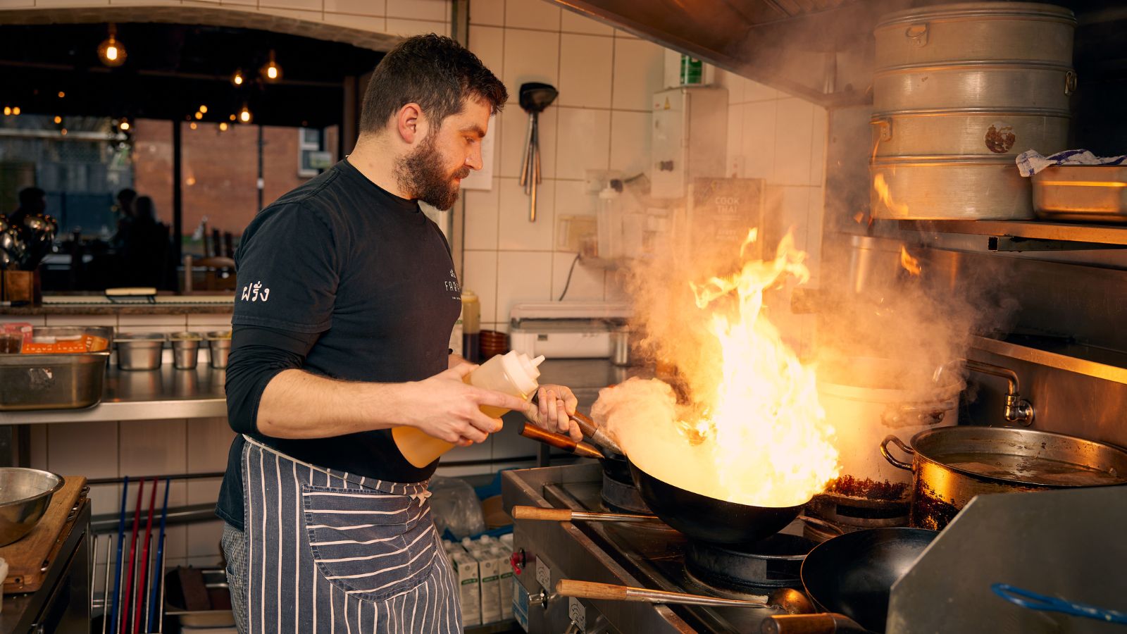 Sebby Holmes cooking Thai