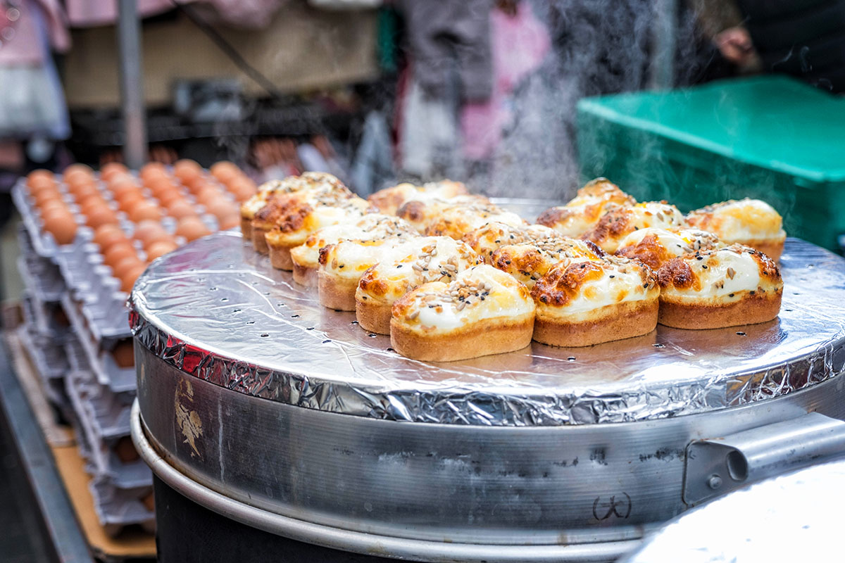 Egg bread with almond, peanut and sunflower seed at Myeong-dong street food, Seoul
