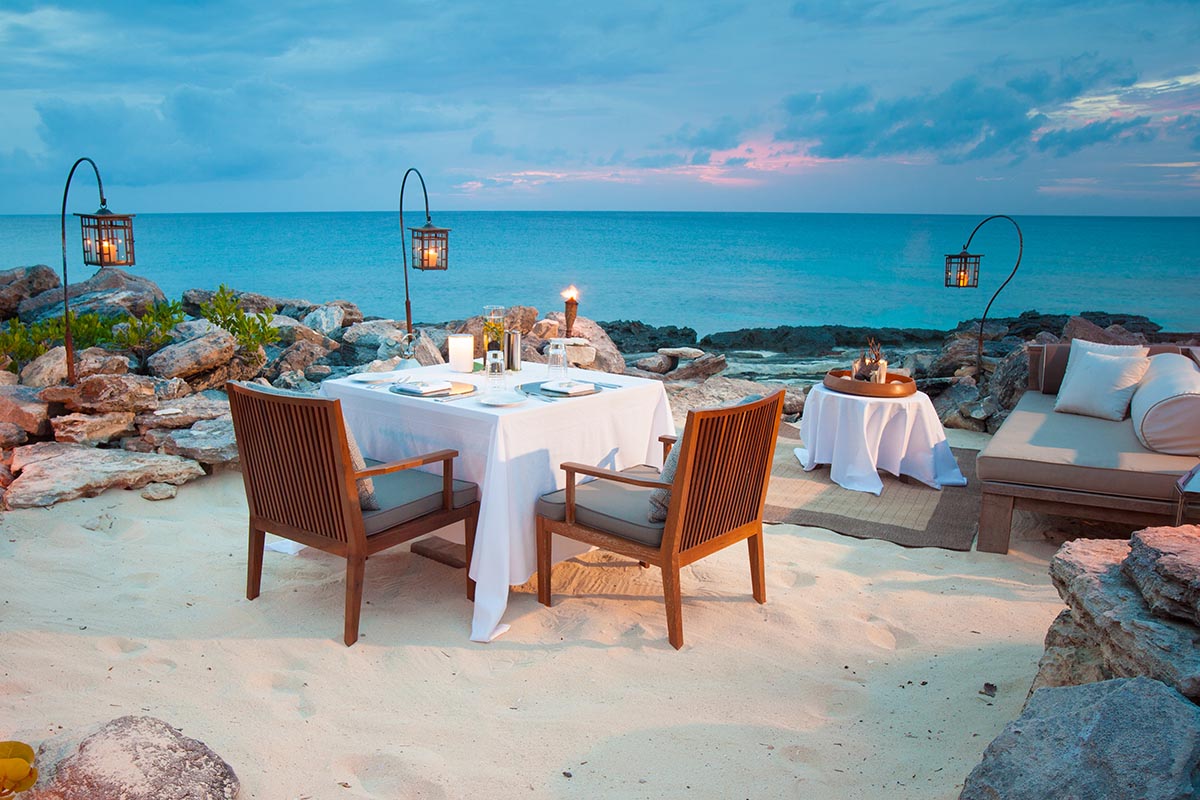 Enjoy a private cove dinner at Amanyara, on the north coast of Providenciales in Turks & Caicos for the best Easter holidays