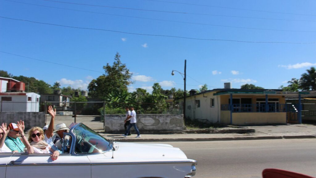 Hen in a car in Cuba