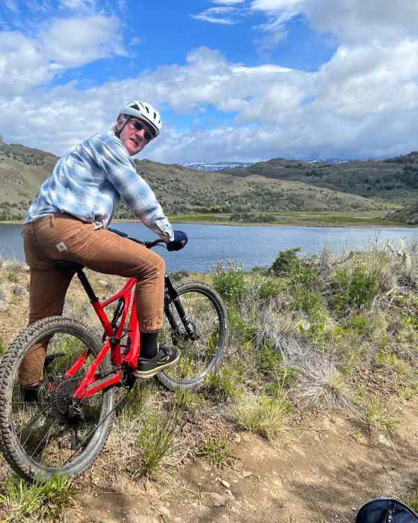 Chris biking on the mountains of Patagonia in Chile