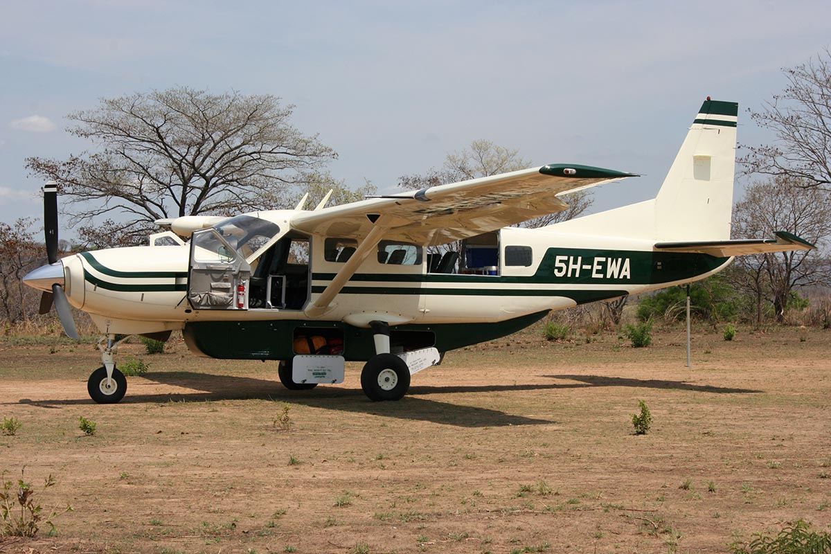 Small private plane at the Lukala Selous Camp Airstrip | Extraordinary trips by private jet | cazenove+loyd