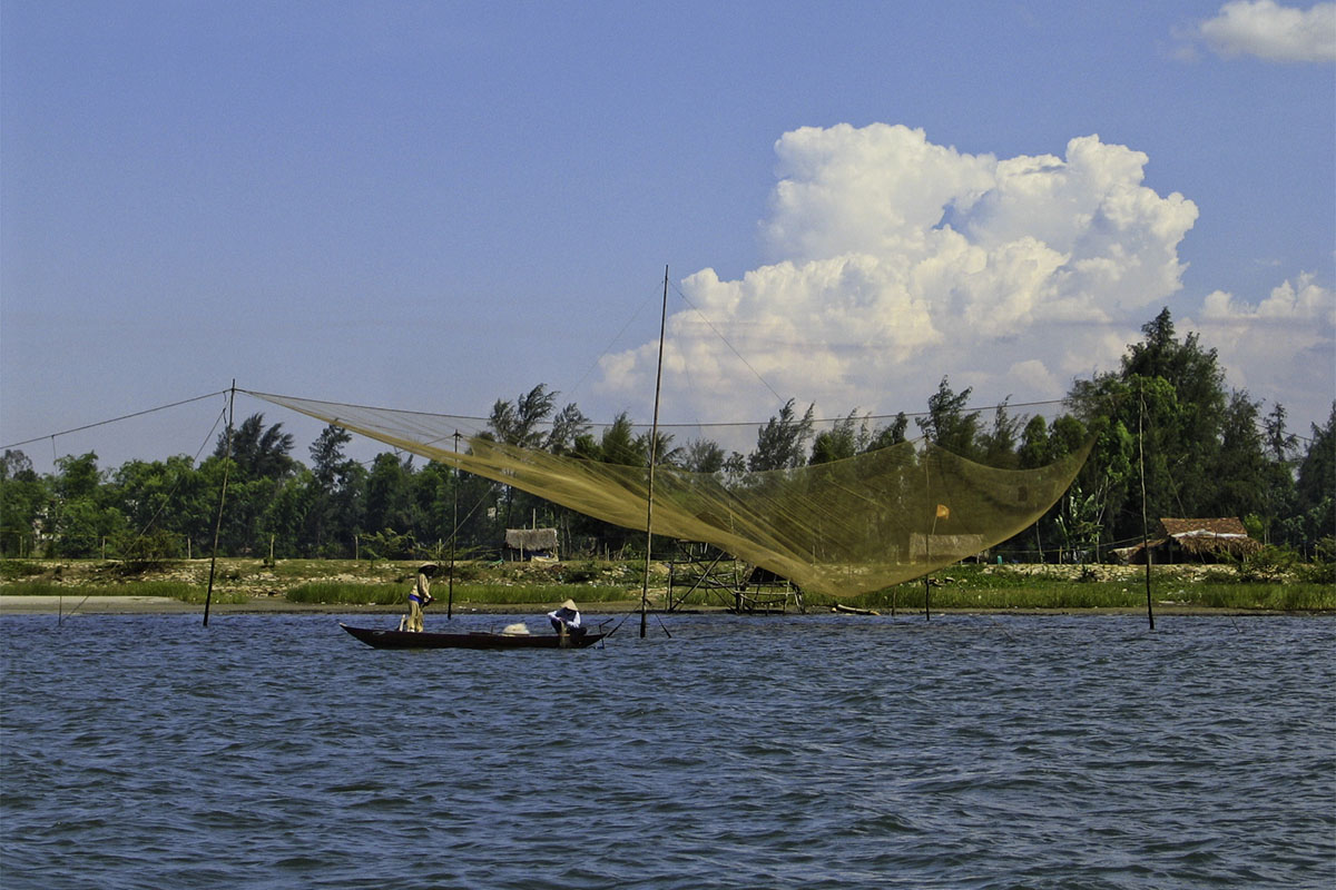 Things to do in Hoi An include fishing in the sea