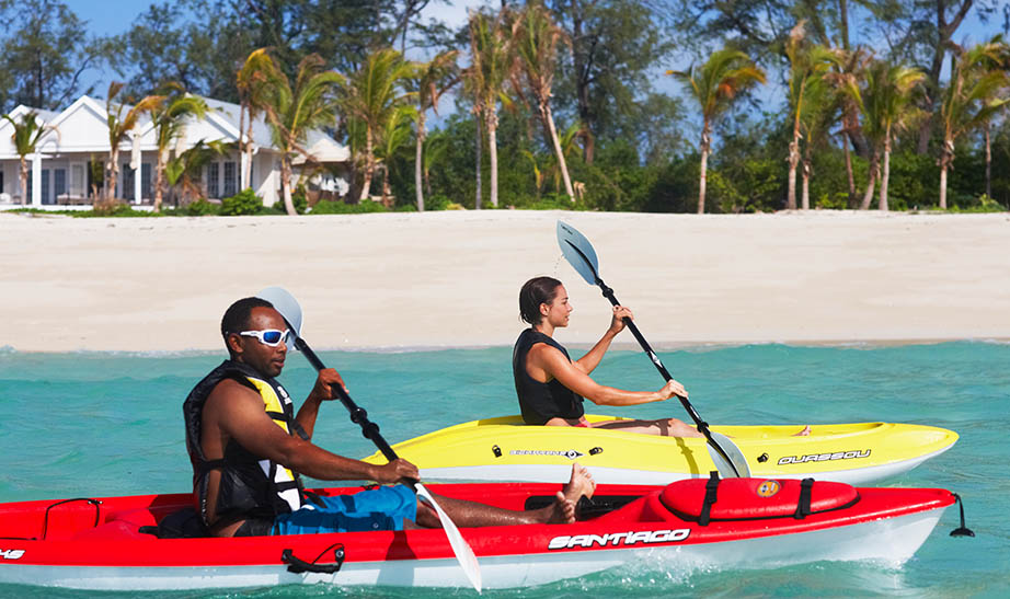 canoeing on your exclusive family holidays in Tanzania