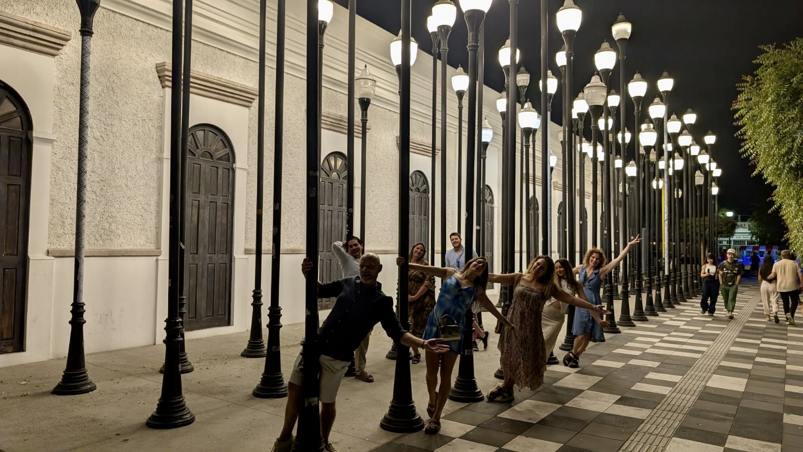 night time walk with lamposts, la paz, mexico