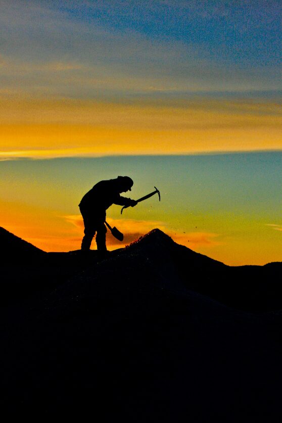 Chipping ice for tea on the icecap