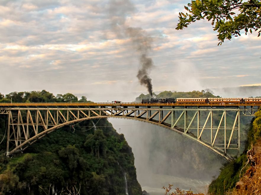 Crossing the Victoria Falls by steam train GETTY