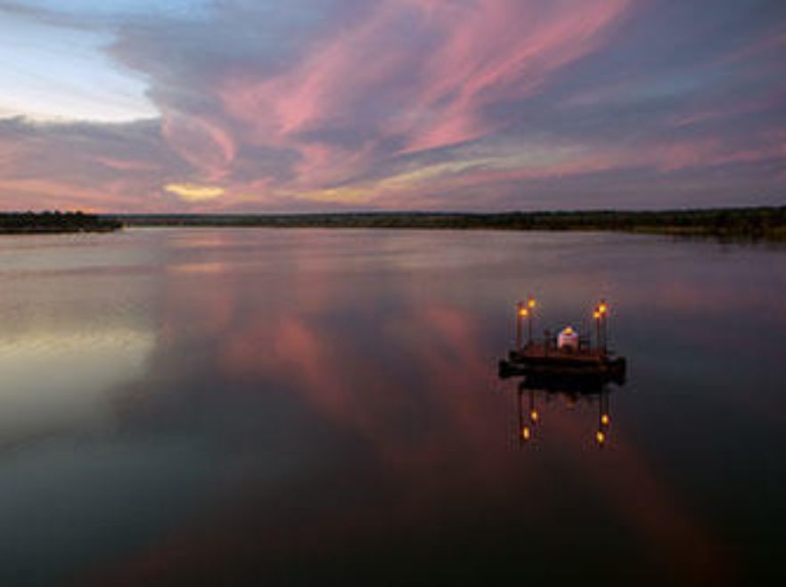 Private dining on the Zambezi, Sindabezi Lodge, Victoria Falls, Zambia
