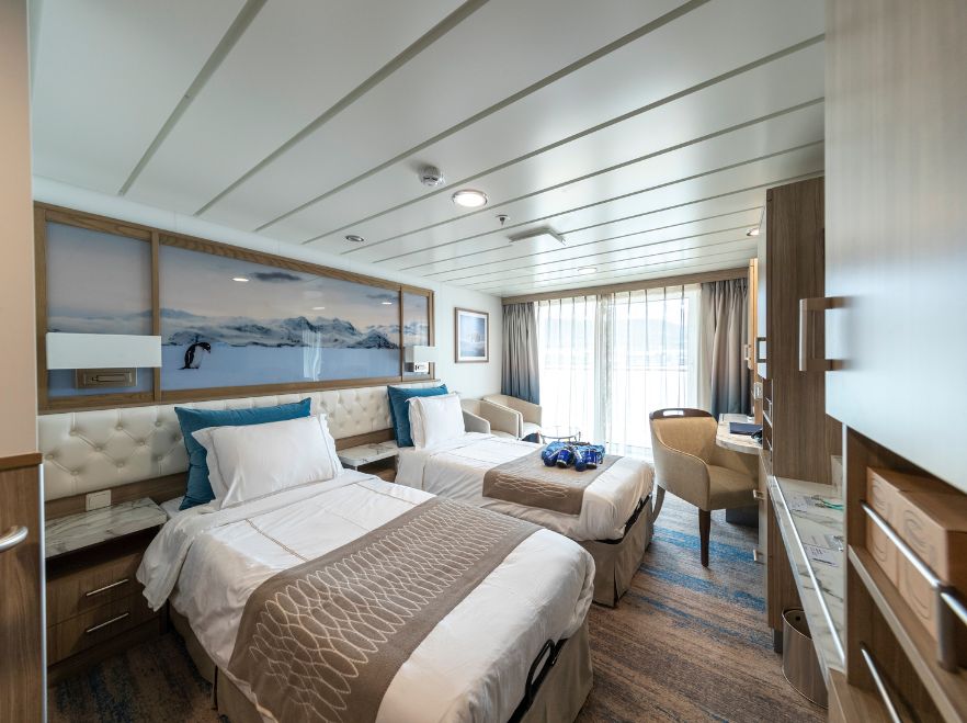 A balcony suite on the Greg Mortimer
