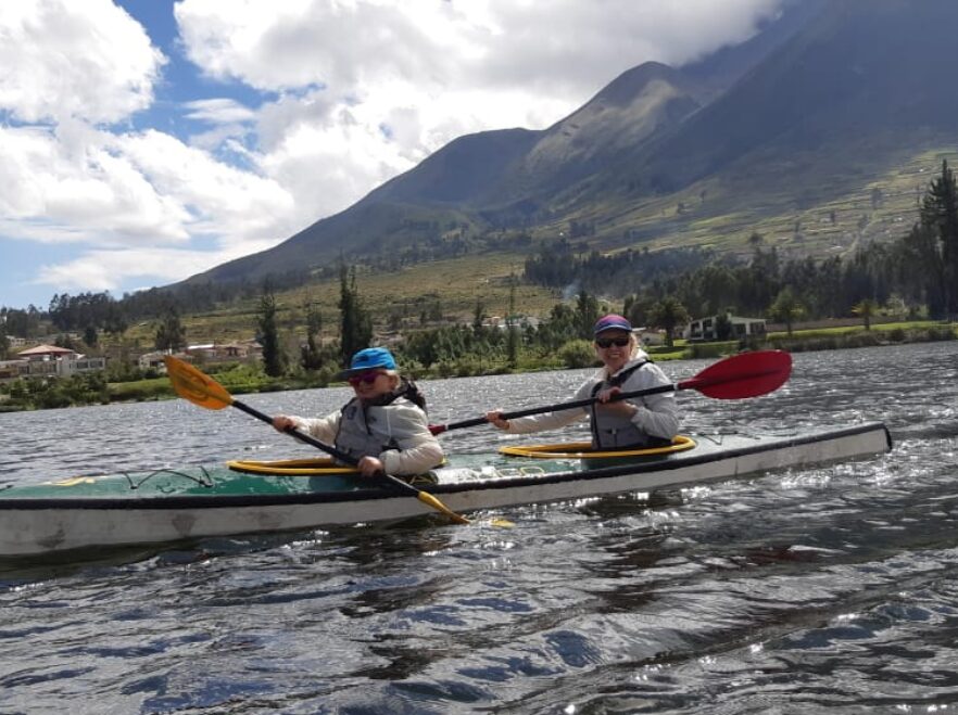 Paddle across lakes, surrounded by mountains