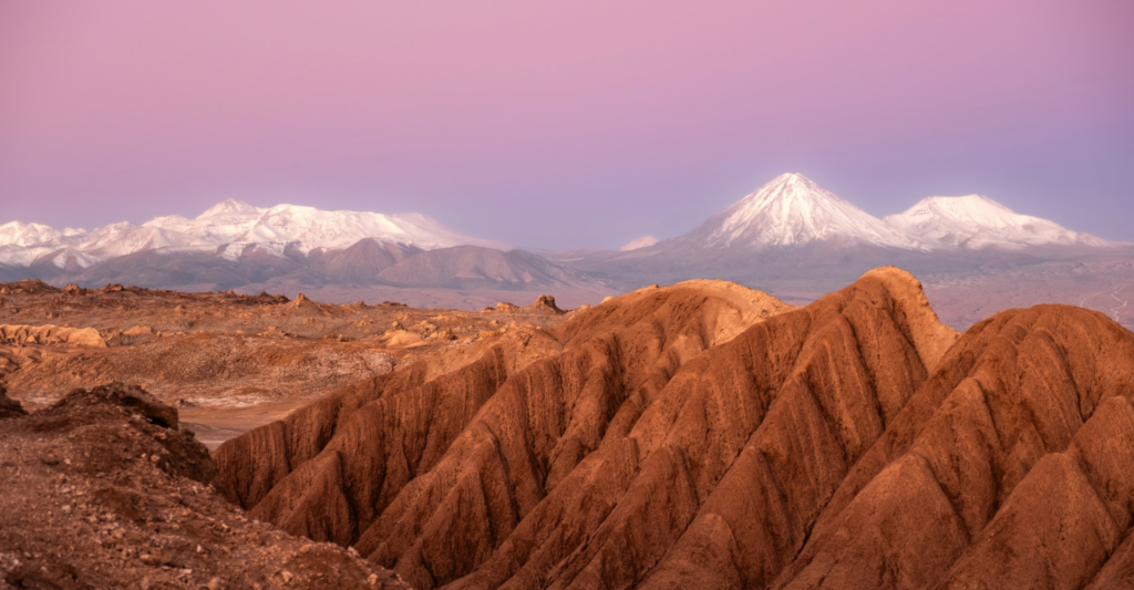 Dramatic Atacama Desert landscape in Chile with rugged mountains and vast open plains